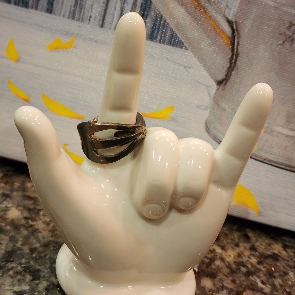 Vintage ring made out of a fork, says Community inside, size 8